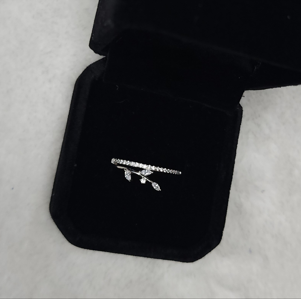 Brand New! Genuine s925 Sterling Silver open style ring. Lab Made Diamond stones